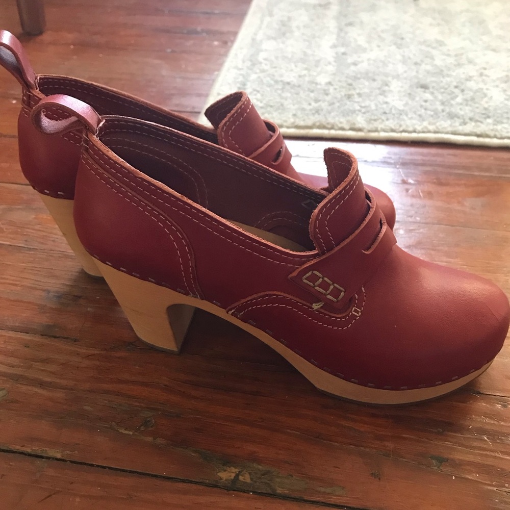 Clog style penny loafer detail. Approx 2.75 heel.